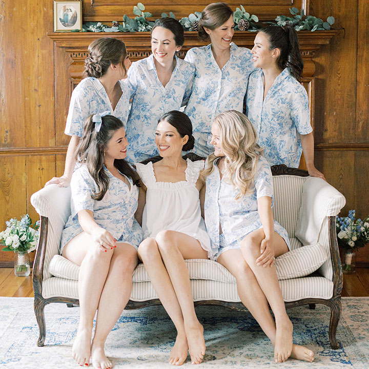 A bride sitting with her bridesmaids in one of Fleetwood Farm Winery's private wedding suites.