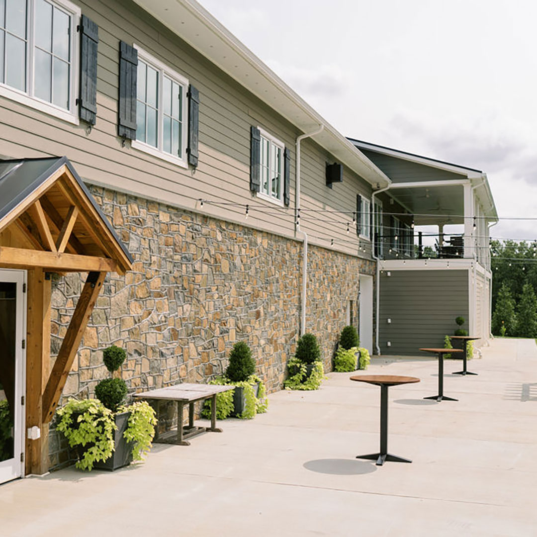 A sizable patio space available as one of Fleetwood Farm Winery's outdoor event venues in Leesburg, Virginia.